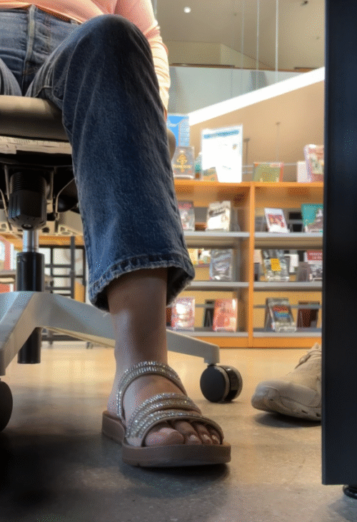 Latina Girl in Sandals while talking to friend - Image 3