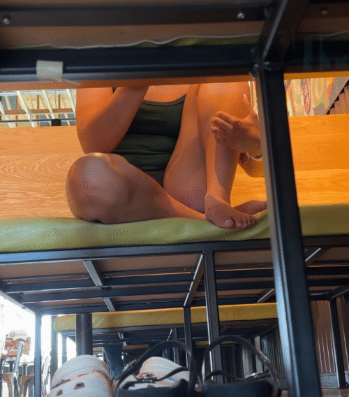 Two Pretty Girls Take Off their Sandals at Diner - Image 5
